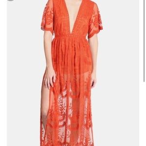 Short sleeve orange romper with lace skirt